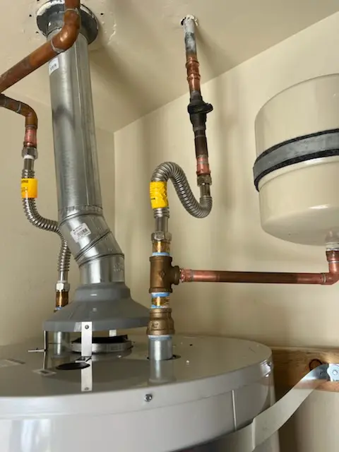 Water heater installation and plumbing repair in Oak Crest